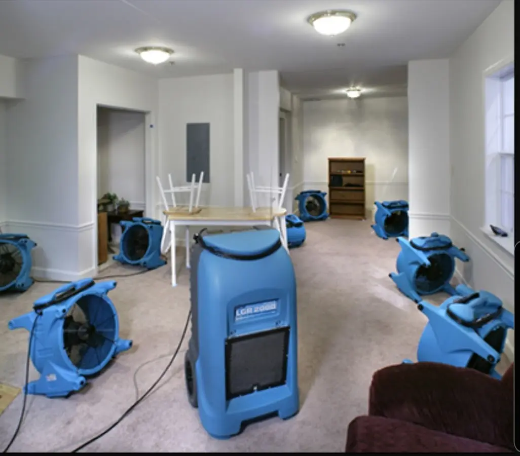 Air movers and dehumidifier setup for Water Damage Restoration in Atchison